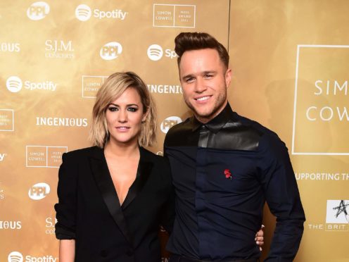 Caroline Flack and Olly Murs (Ian West/PA)