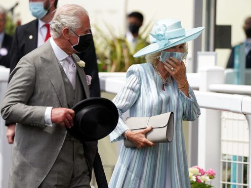 The Prince of Wales and the Duchess of Cornwall on Day One (Andrew Matthews/PA)