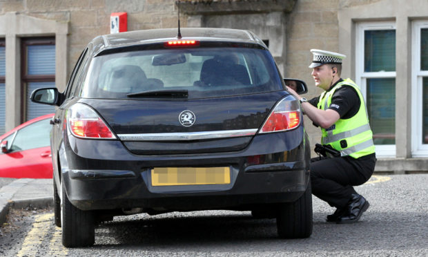 Police will be chatting to, and warning drivers, as they launch their road safety campaign outside schools in Dundee on Monday. (Library image courtesy of Gareth Jennings/DCT Media).