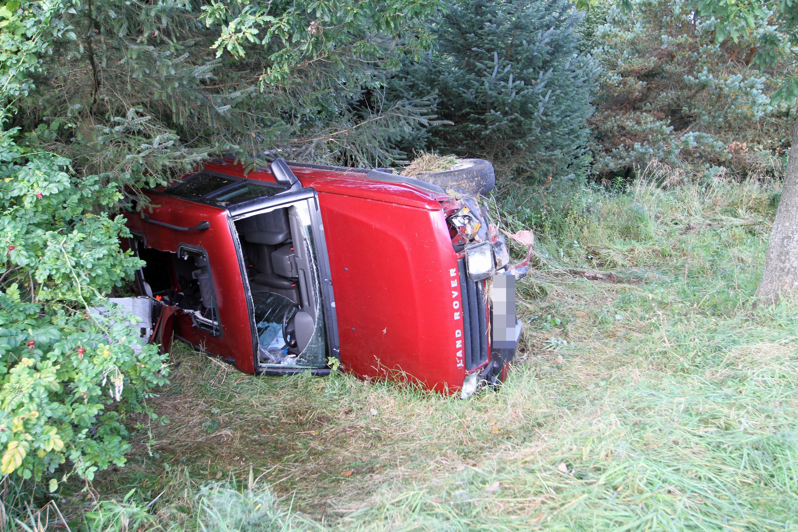 Man cut free from overturned car on edge of Dundee Evening Telegraph