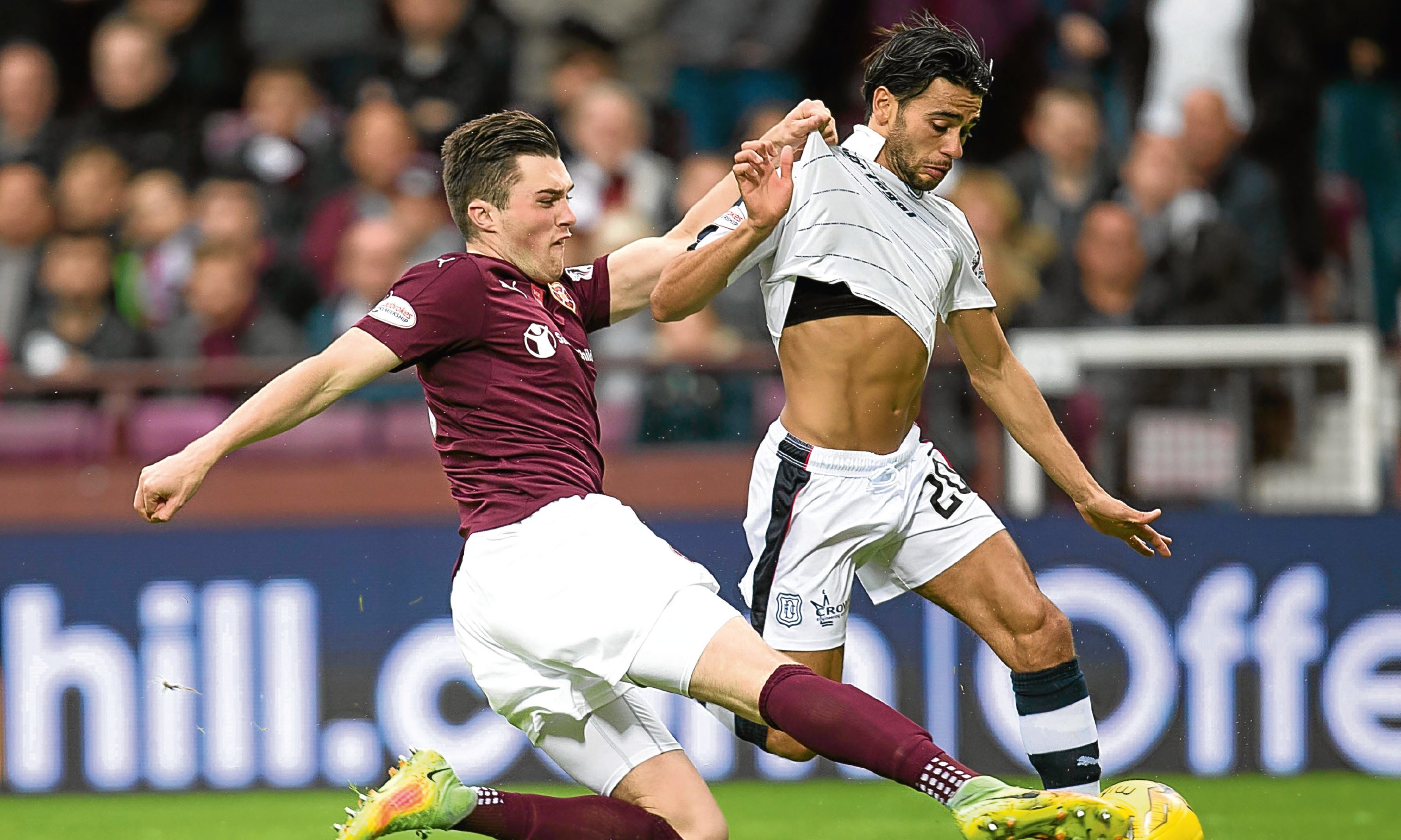 Hearts' John Souttar tackles Dundee's Faissal El Bakhtaoui during Saturday's game.