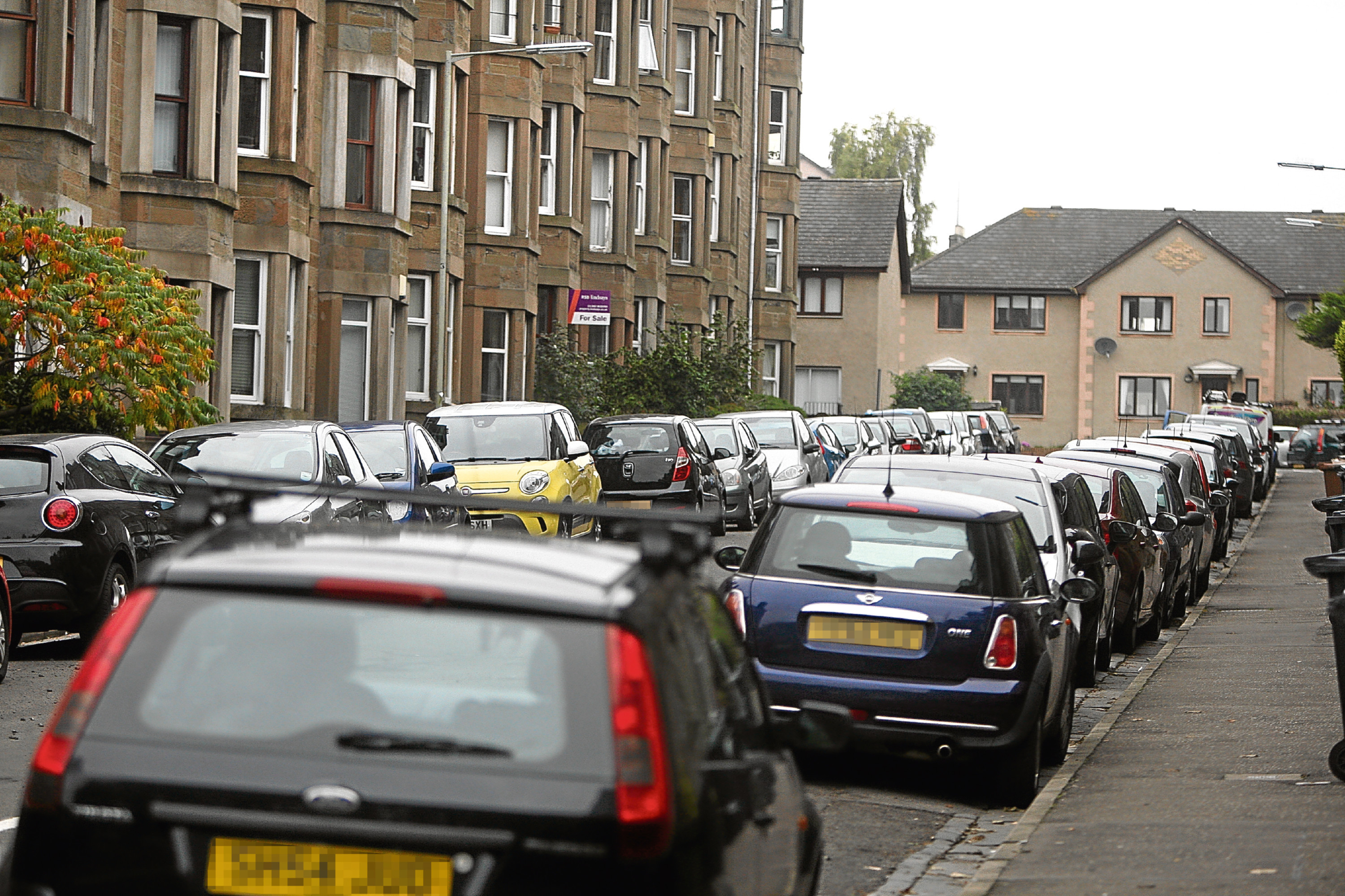 under-used-parking-spaces-may-be-made-available-for-1-a-day-evening