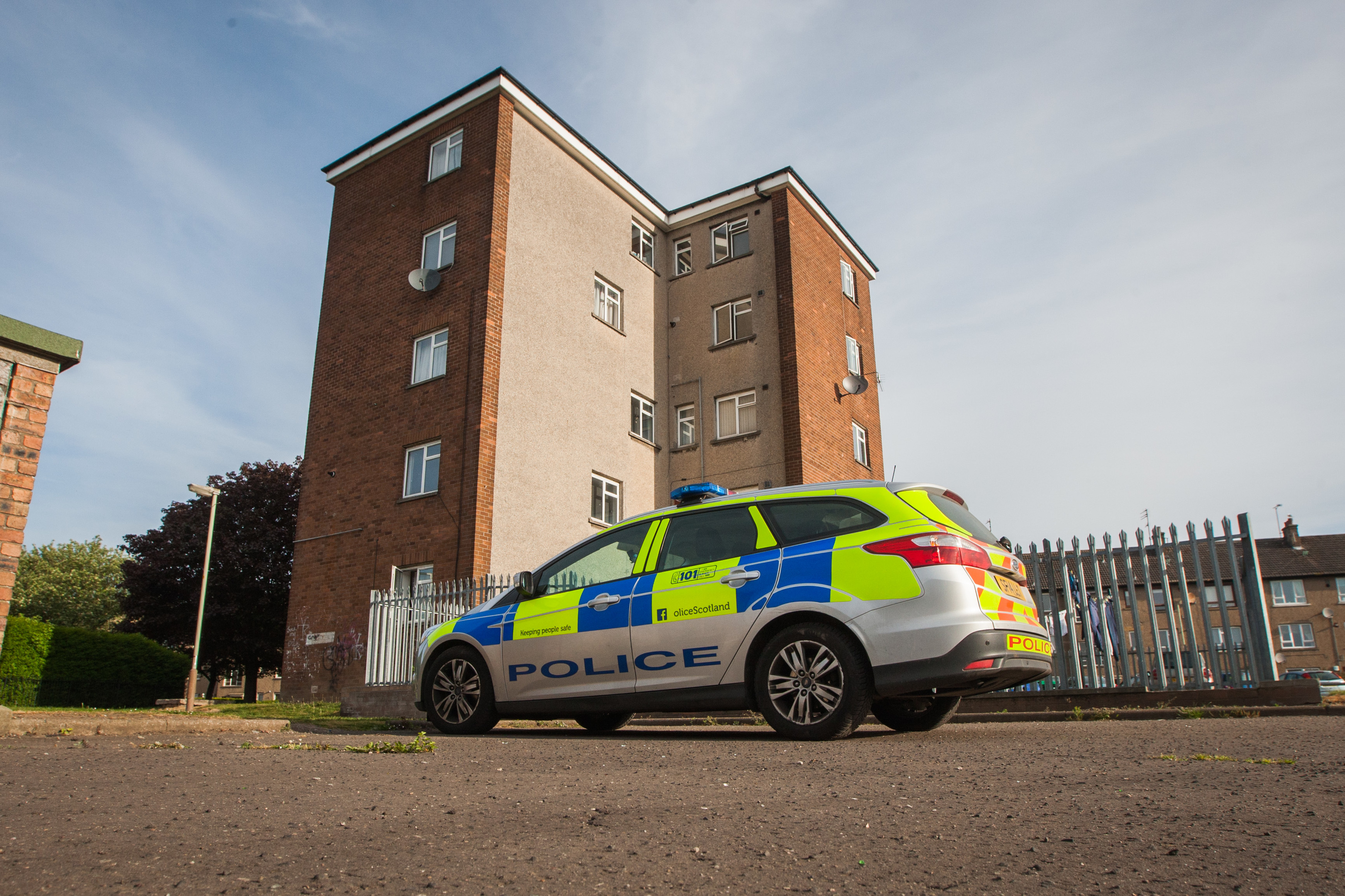 Police outside a block in Kemnay Gardens (library picture)