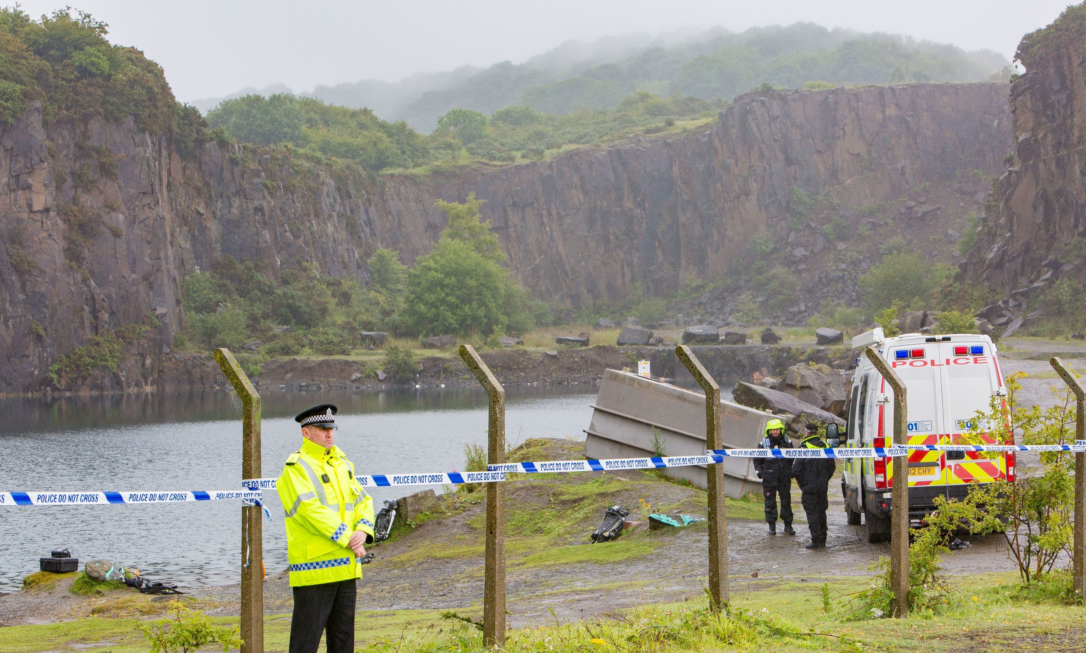 Body recovered in search for missing diver at abandoned quarry where