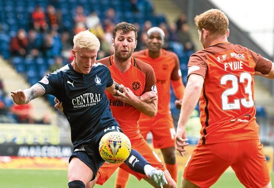 Lewis Toshney impressed on his return to the United starting XI.