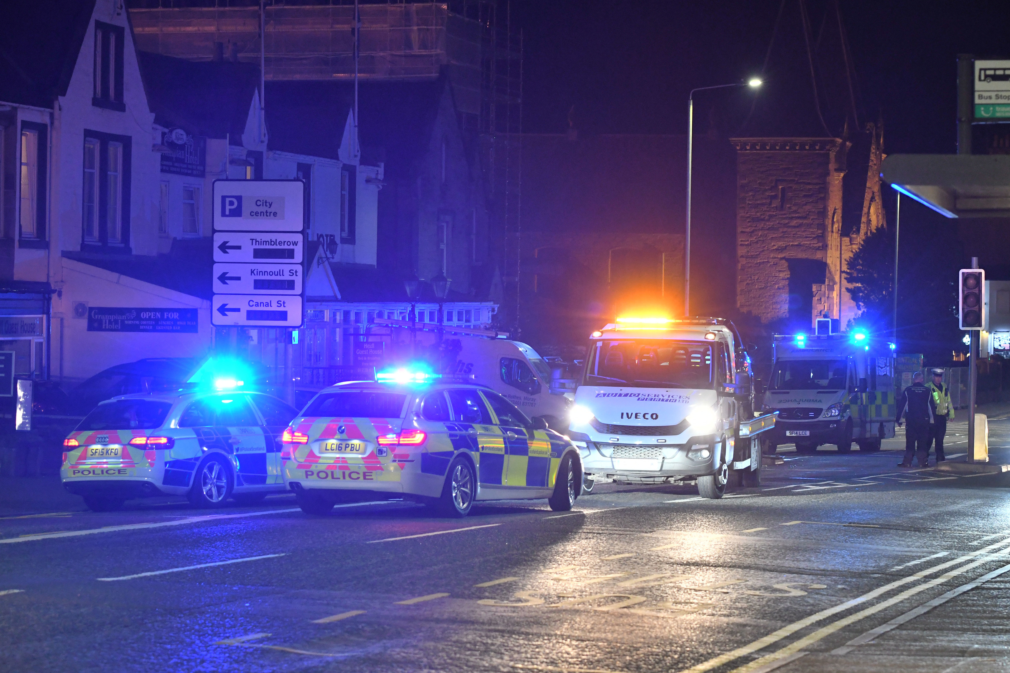 Man in his 50s taken to hospital after car knocks out traffic lights on
