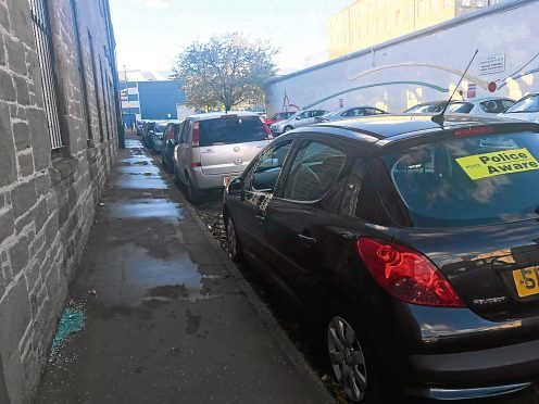 One of the vandalised cars on Brewery Lane