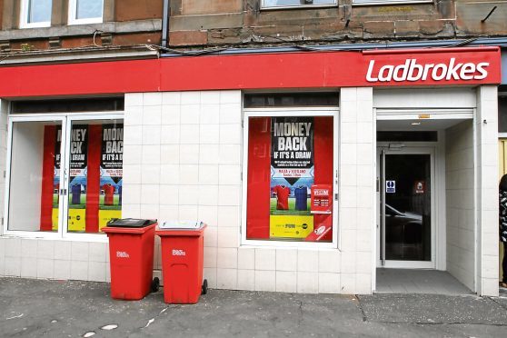 The Strathmartine Road betting shop.