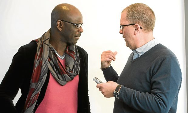Lilian Thuram is interviewed by Tele sports writer Tom Duthie