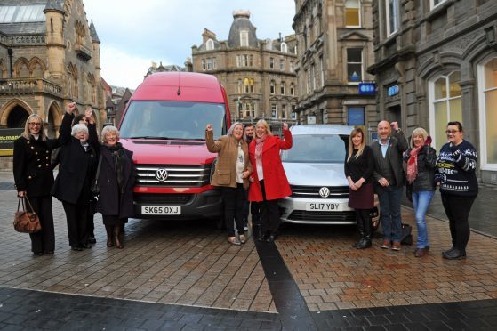 Euromillions winner Gillian Bayford donates a minibus and van to Inclusion Group.