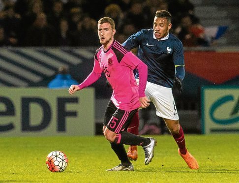 Craig Slater, pictured in action for Scotland U/21s, has signed for Dundee United on loan from Colchester United until the end of the season.