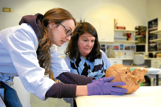 Laura Girdwood and Christina Donald with the skull.