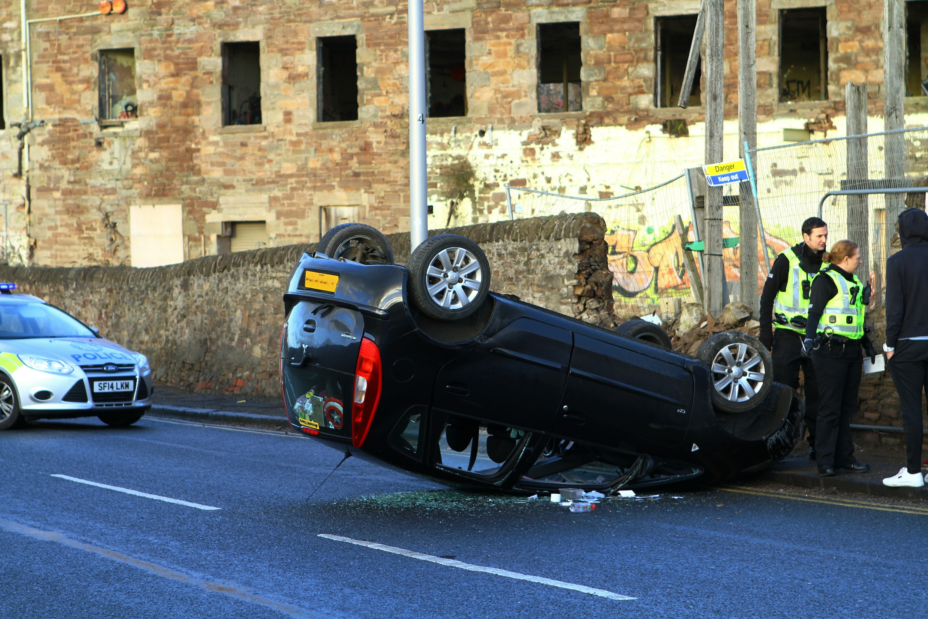 PICTURES Congestion on busy Dundee road after car overturns and flips onto its roof Evening