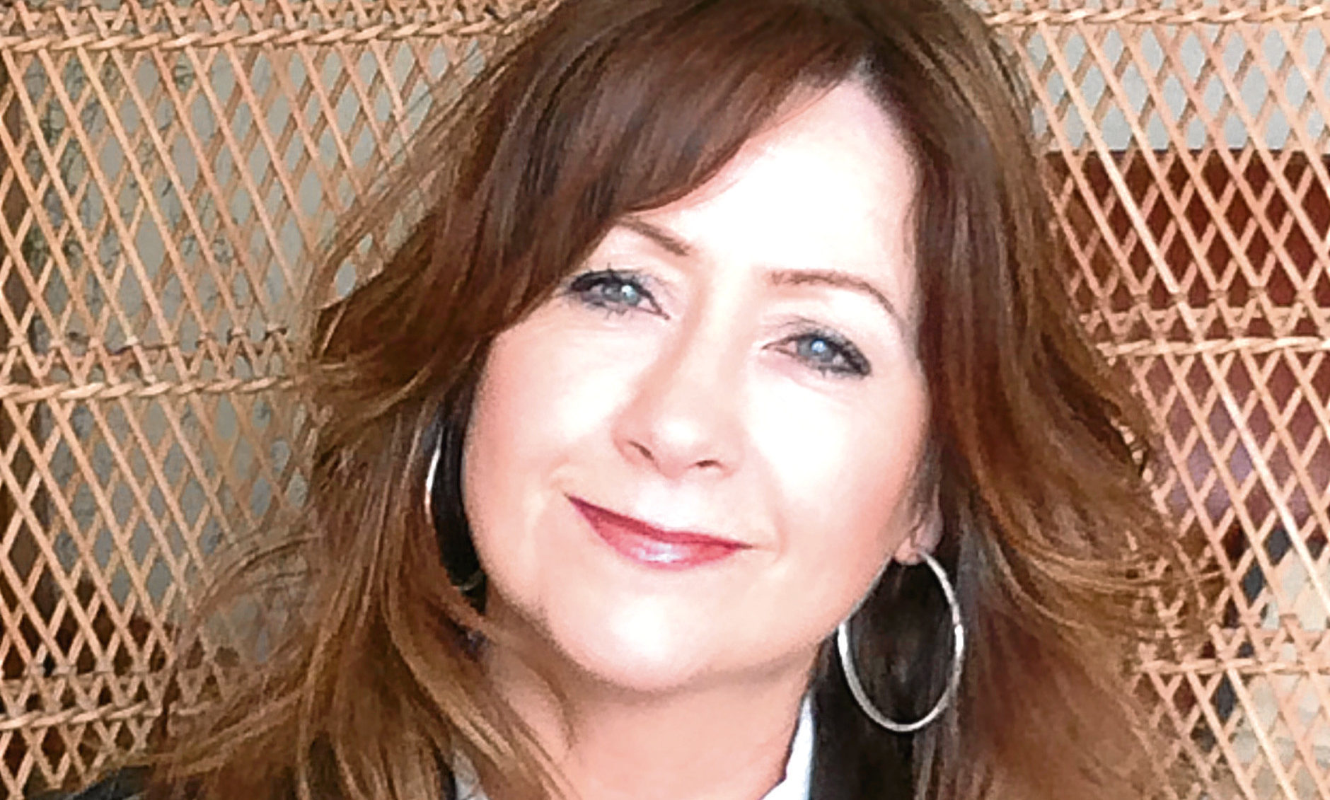 She left school with only one Olevel but now this Dundee hairdresser