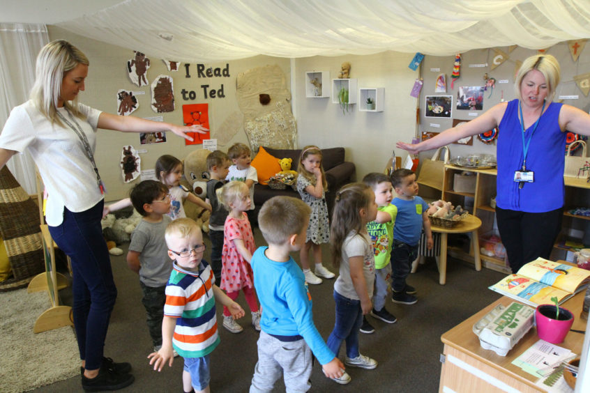 PICTURES Staff at Dundee nursery celebrate exemplary report Evening