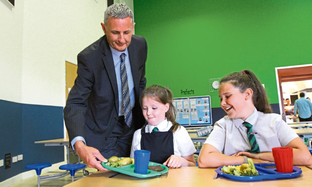 The task of delivering meals to pupils once schools return full time in August will be "challenging" according to Gary Conway