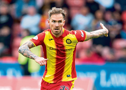 Former Ross County and Partick Thistle midfielder Martin Woods has been on trial at Dundee United over the past few days.