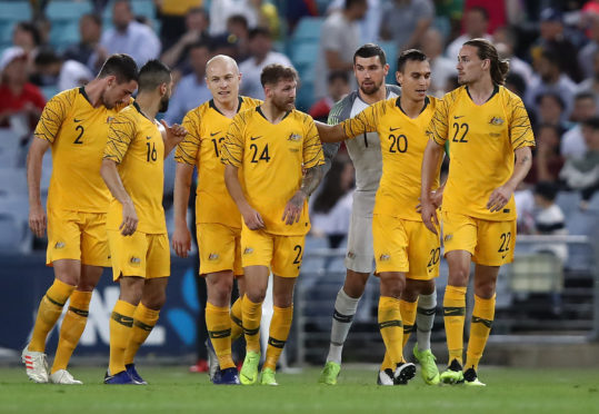 Martin Boyle is congratulated after scoring his teams first goal for Australia