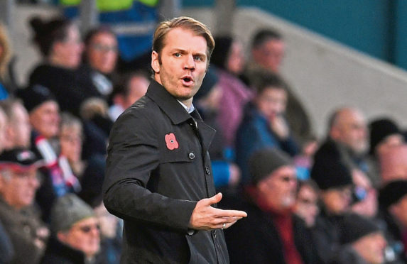 Dundee United manager Robbie Neilson has been impressed with his squad.