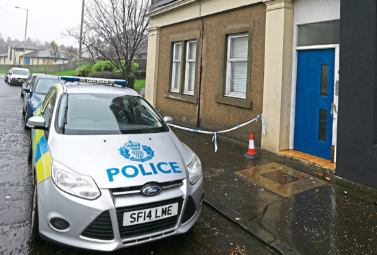 Police at the scene on Logie Street.