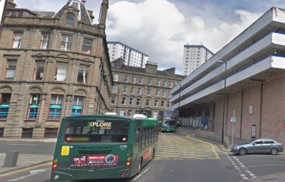 Meadowside and the Wellgate car park (right) where the cone was thrown.