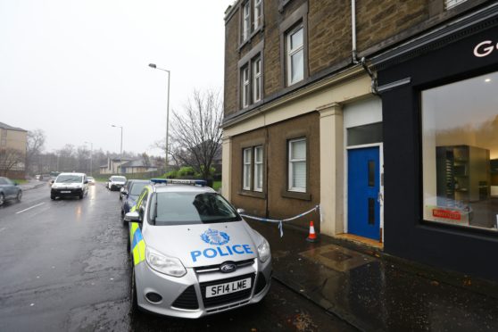 Police on Logie Street where the toddler fell.
