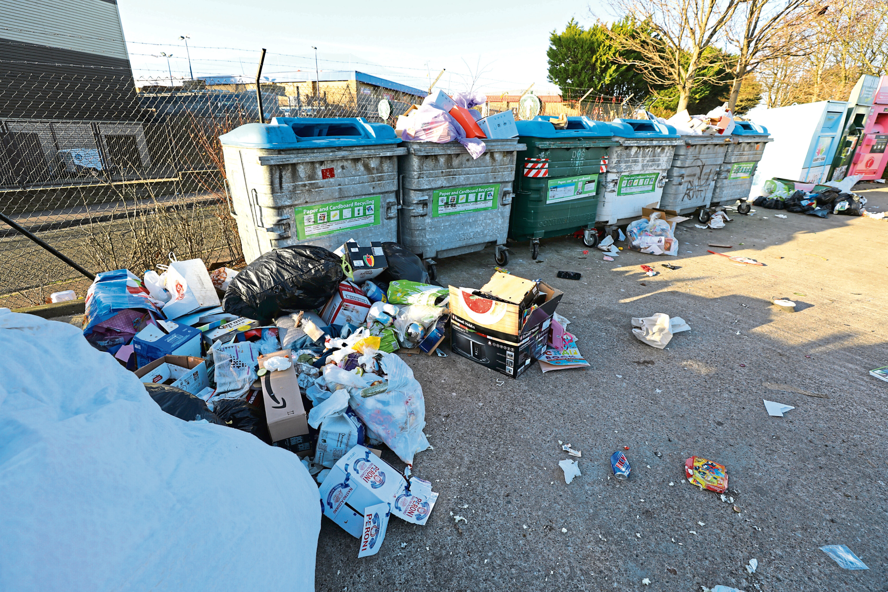 Disgust after rubbish dumped next to bins across Dundee Evening Telegraph