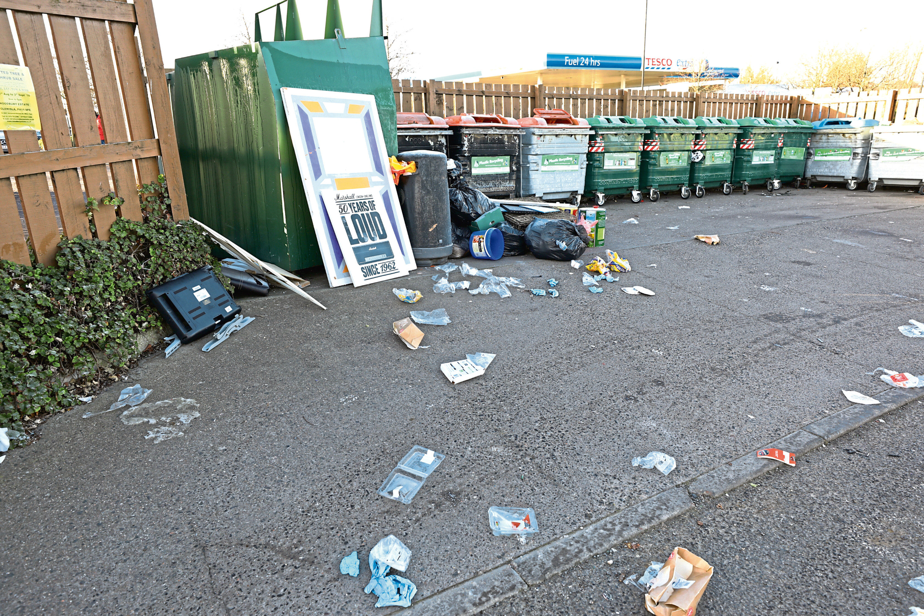 Disgust after rubbish dumped next to bins across Dundee Evening Telegraph