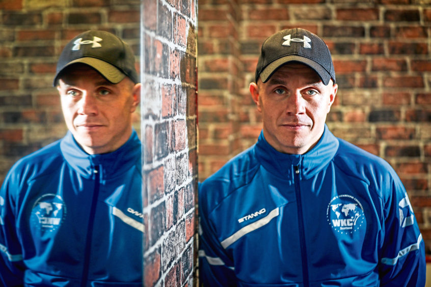 Dundee kickboxer Sean wins world title after three years away from the