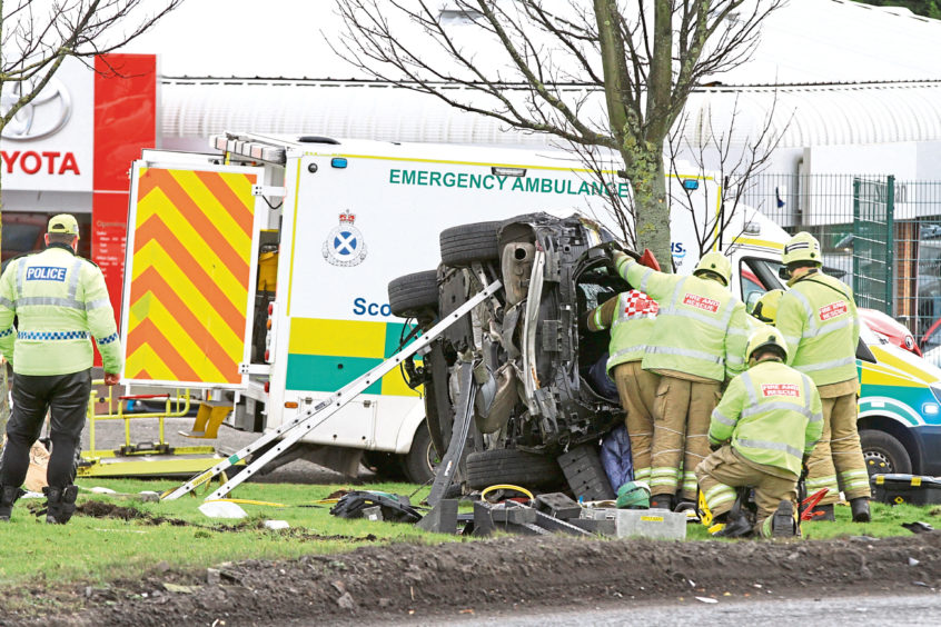 Several taken to Ninewells and casualty still trapped in vehicle after Dundee crash Evening