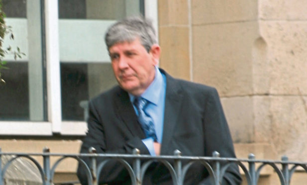Andrew Bayne leaving Dundee Sheriff Court