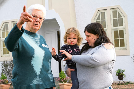 Rhona Armitage, left, with Kelly McMillan and her two-year-old daughter Robyn