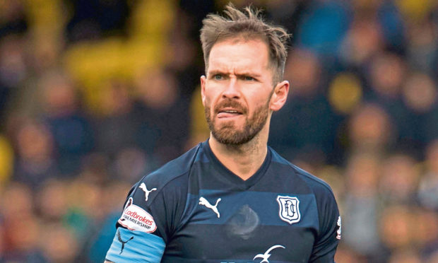 Martin Woods has signed for Halifax Town.