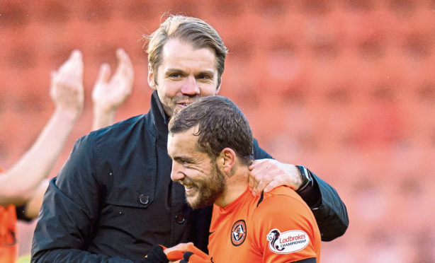 Dundee United manager Robbie Neilson and Paul McMullan.