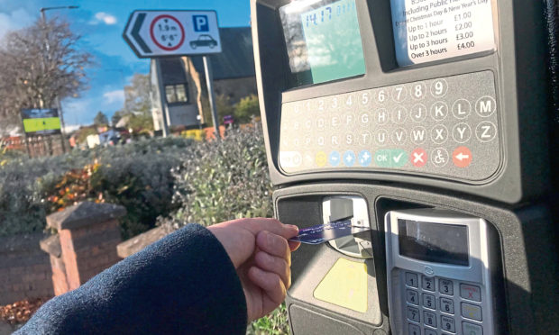 Parking will remain free in Angus for another six months, to help shops in the region.