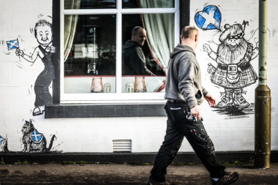 Ian's unfinished work on the side of the Last Cast Pub