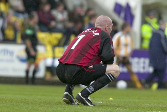 Former Dundee goalkeeper Derek Soutar at full-time at Almondvale after Dundee were relegated from the SPL following a 1-1 draw with Livingston back in 2005.