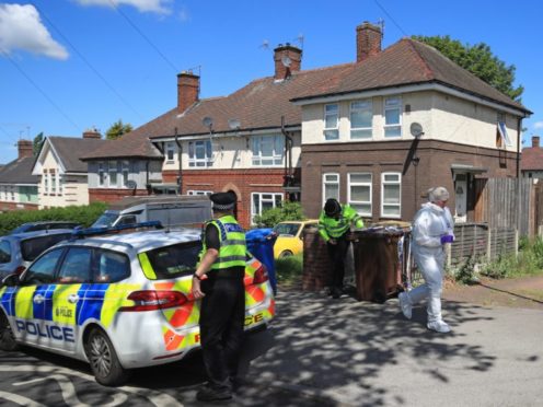 Police at a property on Gregg House Road in Shiregreen, Sheffield (Danny Lawson/PA)