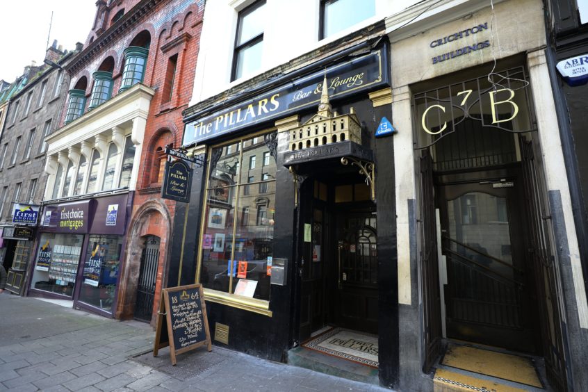 Dundee pub owner's delight at racist robber's jail sentence Evening