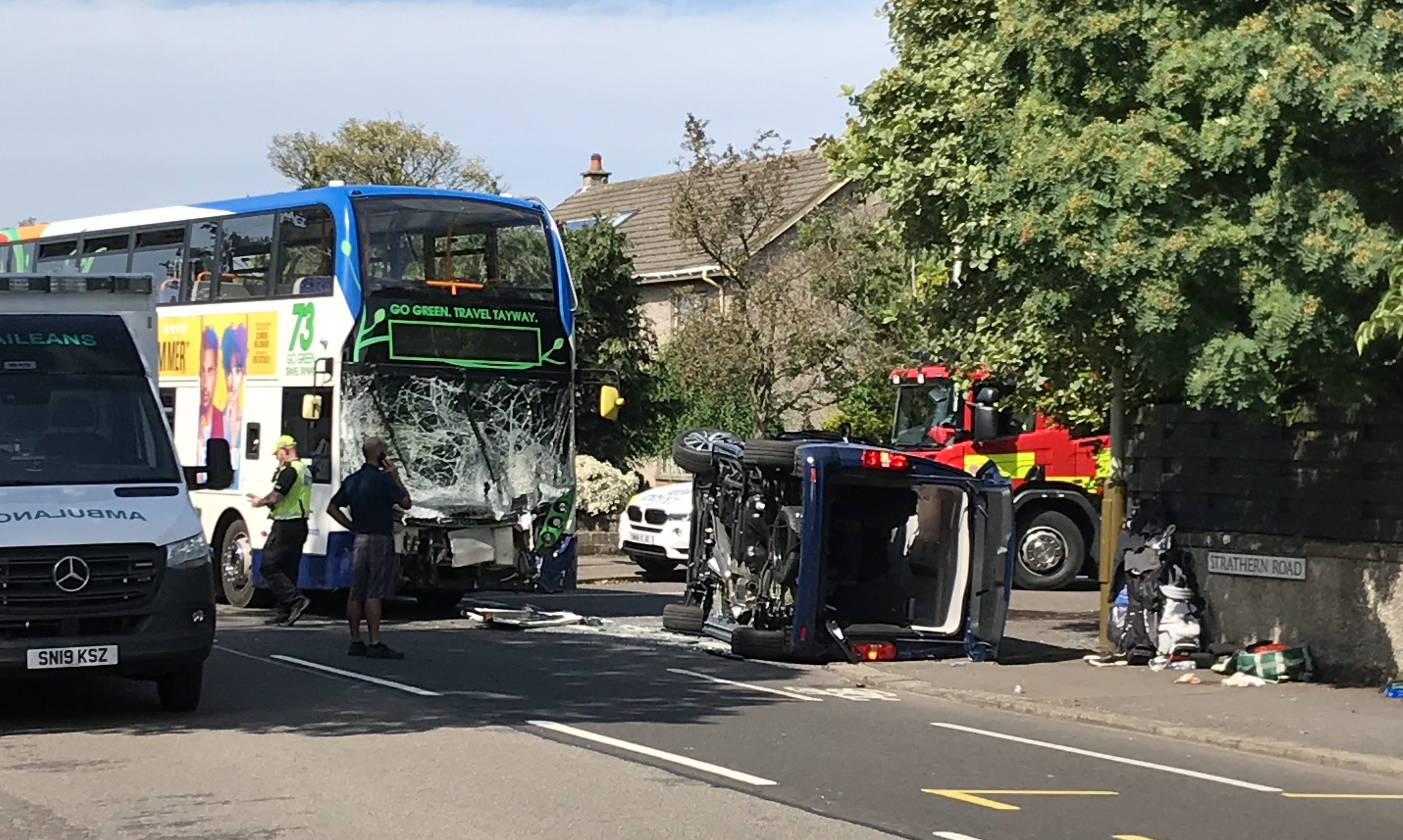 Several injured following crash between people carrier and bus on Dundee road Evening Telegraph
