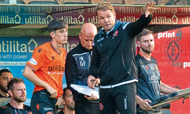 Dundee United's Chris Mochrie with manager Robbie Neilson