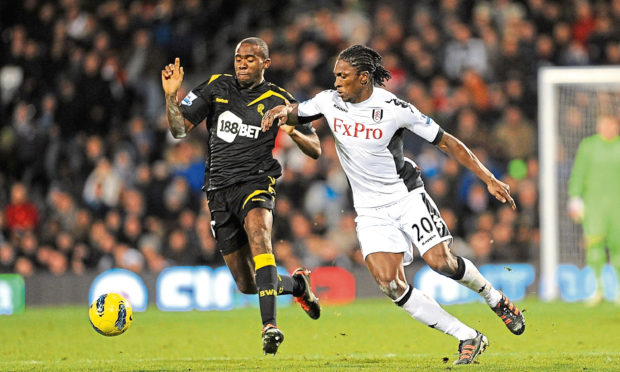 Fabrice Muamba (left).