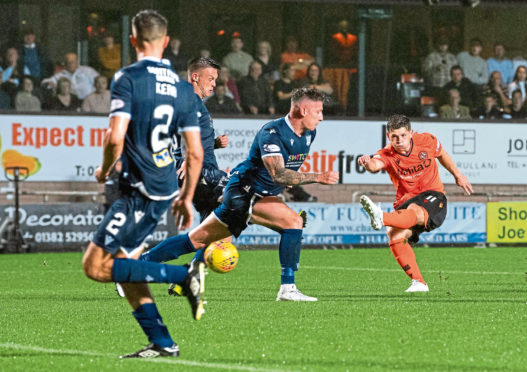 Cammy Smith scores to make it 6-2 during the Dundee derby on August 30.