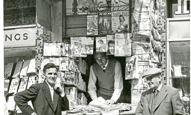 The old "Hub" news stand in Dundee city centre, which was at one point the smallest shop in the UK, shown here in 1960.