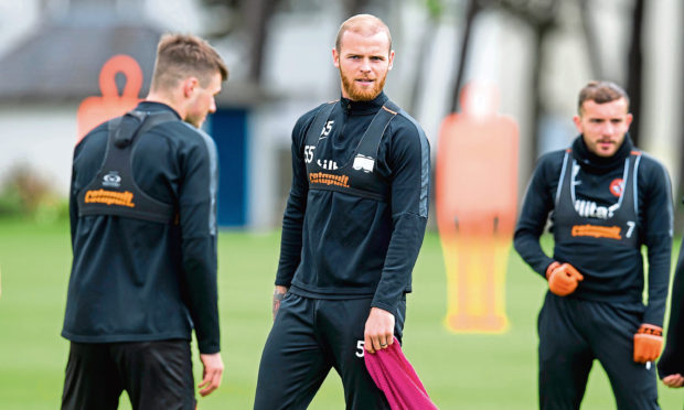 Dundee United's Mark Connolly (centre), in training.