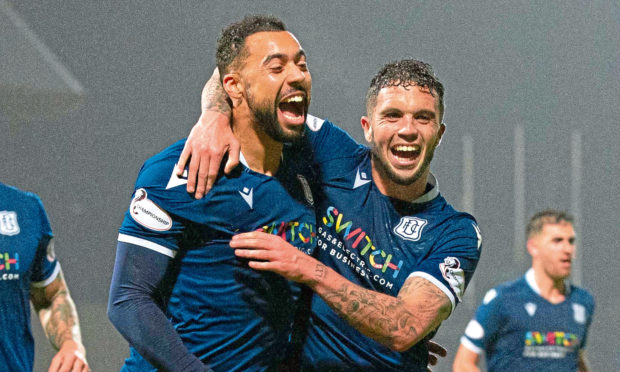 Dundee's Kane Hemmings (left) celebrates a goal with Declan McDaid.