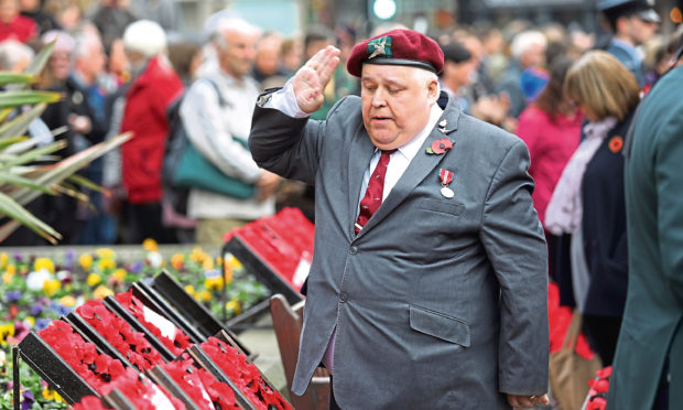 A salute to the wreaths at a parade on Remembrance Sunday 2018.