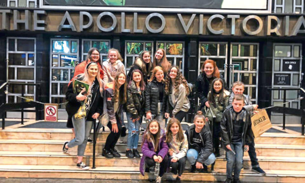 The children at the Apollo Victoria Theatre.