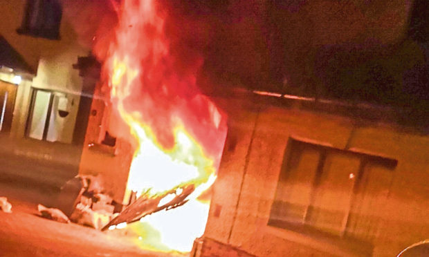 The garage on fire.