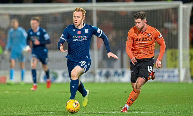 Johnson on the ball against Dundee United at Dens on Friday.